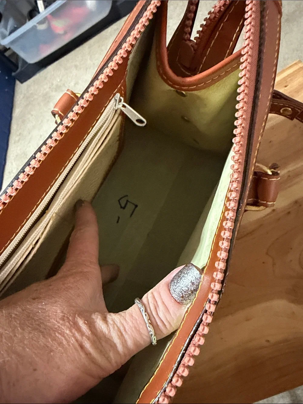 Dooney & Bourke Cream Leather Satchel with Brown Trim